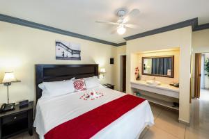 Voodi või voodid majutusasutuse Baker's Suites toas