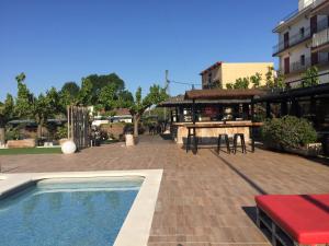 Bazén v ubytování Hostal SolFina nebo v jeho okolí