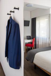 Voodi või voodid majutusasutuse Hotel Cereda toas