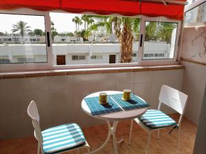 A balcony or terrace at Oasis Marina Apartament