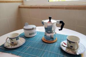 Coffee and tea making facilities at Oasis Marina Apartament