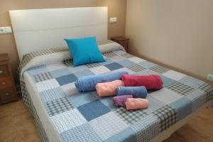 Ein Bett oder Betten in einem Zimmer der Unterkunft Oasis Marina Apartament
