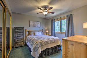 A bed or beds in a room at Secluded Lakehouse with Private Dock and Serene Views!