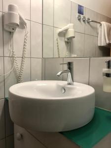Koupelna v ubytování Weingut & Gästezimmer Edelmann