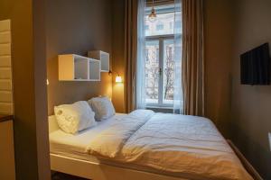 Posteľ alebo postele v izbe v ubytovaní Comfortzone Zagreb Center