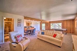 a living room with a couch and a piano at Stateline Escape - 6 Mi to Heavenly and Lake Tahoe! in Stateline