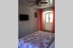 Postel nebo postele na pokoji v ubytování Apartman Knezovic