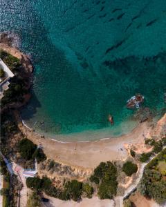 an aerial view of a beach and the ocean at Luxurious Beachfront Villa Maira in Aghia Marina