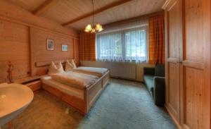 Postel nebo postele na pokoji v ubytování Haus Christl + 14 fotografií