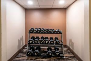 a room with a rack of wine bottles at Red Roof Inn Dahlgren - Naval Base in Dahlgren