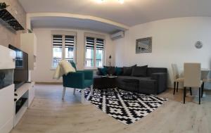 Sjónvarps- og/eða afþreyingartæki á Apartman SILVER