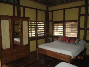 Krevet ili kreveti u jedinici u okviru objekta Cerros Beach Inn