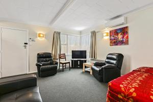 Μια τηλεόραση ή/και κέντρο ψυχαγωγίας στο Arcadia Motel +27 φωτογραφίες