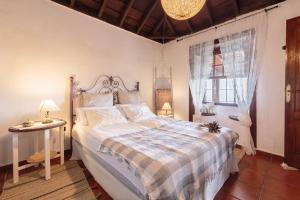 A bed or beds in a room at Casita Estrella del Norte