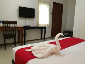 Postel nebo postele na pokoji v ubytování De Langkawi Resort and Convention Centre