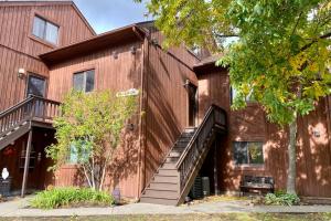 a building with a staircase in front of it at Brand New! MountainCreek SlopeSide Condo,Golf,&Spa in Sand Hills