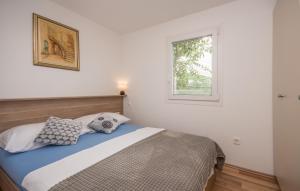 Postel nebo postele na pokoji v ubytování Mobile home Sea Bream