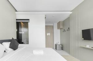 TV a/nebo společenská místnost v ubytování B48 Hotel