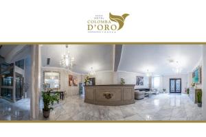 a lobby with a reception desk in a building at Hotel Colomba D'Oro in Tropea