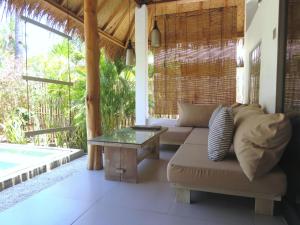 Χώρος καθιστικού στο Breathe Villa Meno