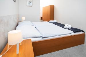 Postel nebo postele na pokoji v ubytování Hotel VP1