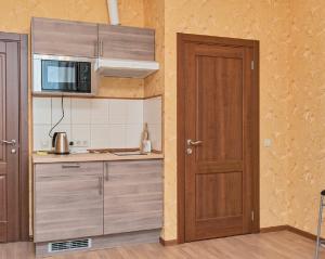 Una cocina o zona de cocina en Apart-studio Piligrim on Popova 33A