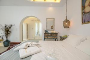 Valena Mare Suites & Apartments客房内的一张或多张床位