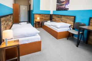 Postel nebo postele na pokoji v ubytování Hotel VP1