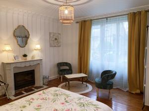 Postel nebo postele na pokoji v ubytování La Part des Anges