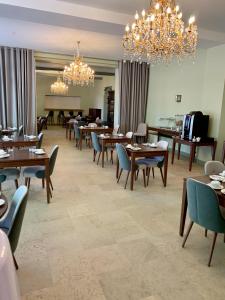 Restoranas ar kita vieta pavalgyti apgyvendinimo įstaigoje Hotel Haras De La Potardiere