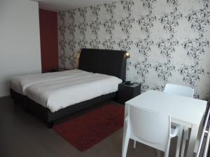 Letto o letti in una camera di Hotel Panorama