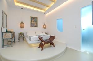 Valena Mare Suites & Apartments客房内的一张或多张床位