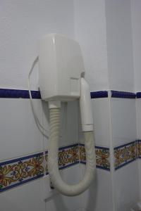 Een badkamer bij Hotel Doña Lina