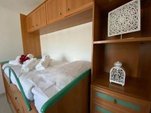 Postel nebo postele na pokoji v ubytování Casa Noni