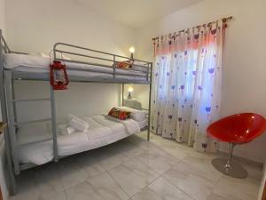 Postel nebo postele na pokoji v ubytování Casa Noni
