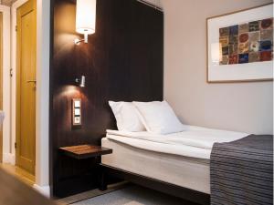 Postel nebo postele na pokoji v ubytování Hotel Tylösand