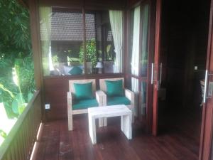 Posezení v ubytování Villa Wedang