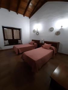Ένα ή περισσότερα κρεβάτια σε δωμάτιο στο Casa La Torera