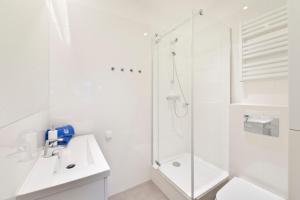 Kúpeľňa v ubytovaní Apartamenty Grobla III Q4Apartments + 16 fotografií