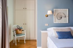 Postel nebo postele na pokoji v ubytování Hotel Punta Nord Est