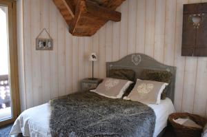מיטה או מיטות בחדר ב-L'Eglantine