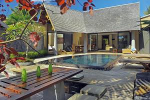 Бассейн в Trou aux Biches Beachcomber Golf Resort & Spa или поблизости