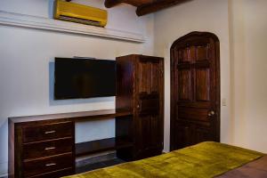 TV a/nebo společenská místnost v ubytování Castillo Blarney Inn