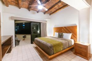 Postel nebo postele na pokoji v ubytování Castillo Blarney Inn + 37 fotografií