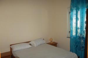
Ein Bett oder Betten in einem Zimmer der Unterkunft Residenza Altmar
