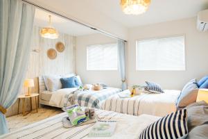 Gallery image of Guesthouse Seawall in Ginowan