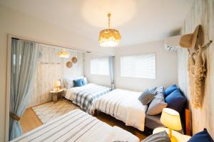 Llit o llits en una habitació de Guesthouse Seawall