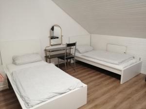 Ένα ή περισσότερα κρεβάτια σε δωμάτιο στο Apartment BLN +10 φωτογραφίες