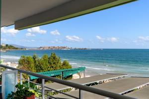 a view of the beach from a balcony at Evridika Apartments in Nesebar