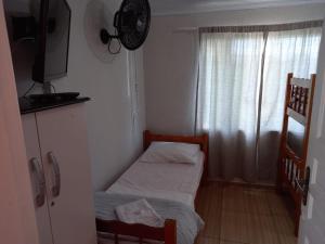 Postel nebo postele na pokoji v ubytování POUSADA ALEFER